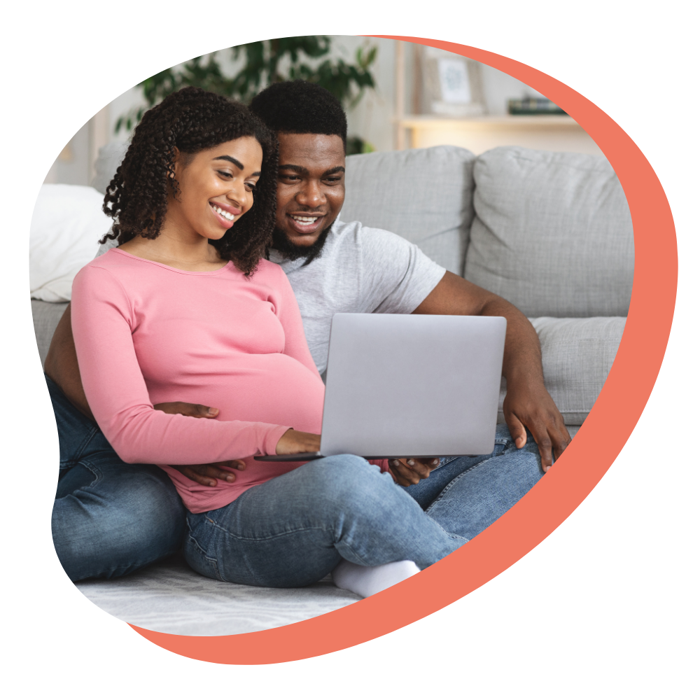 Pregnant couple taking online birth classes