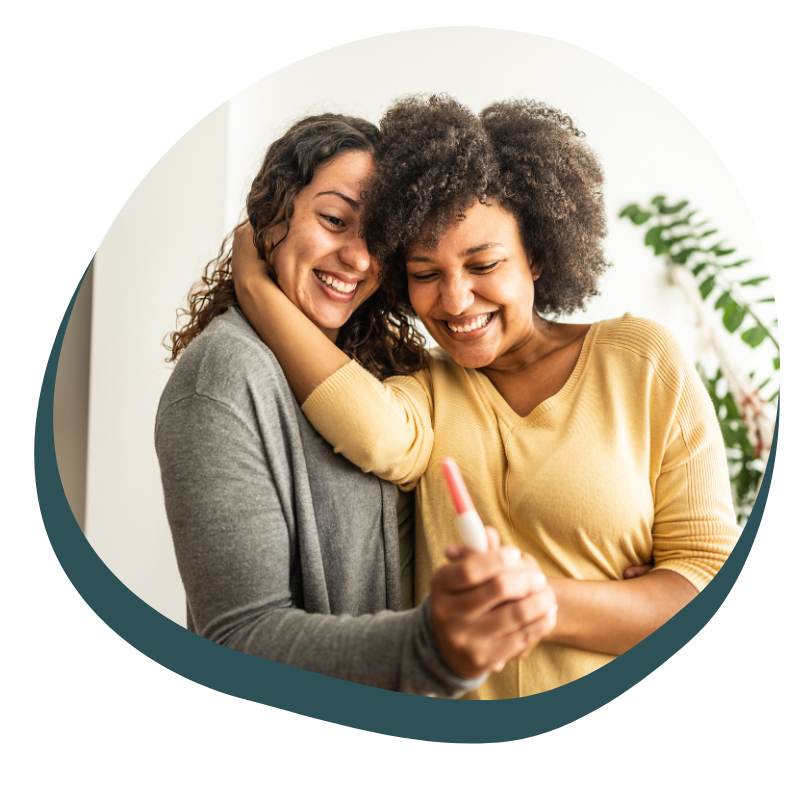 couple holding a pregnancy test